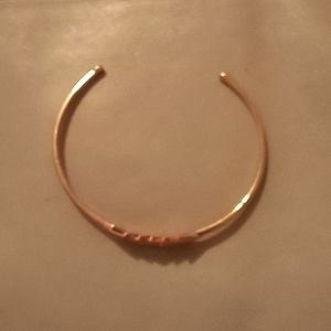 Rose gold and cubic zirconia bangle